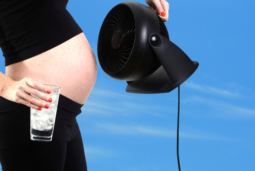 Pregnancy,Hormones,And,Hot,Flash,With,Fan,And,Glass,Of