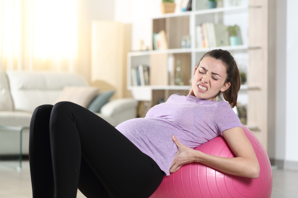 Pregnant,Woman,Suffering,Accident,While,Is,Exercising,With,A,Ball