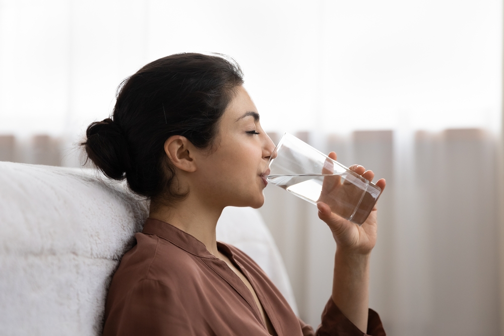 Drinking,Water.,Side,View,Young,Indian,Woman,Enjoy,Pure,Fresh